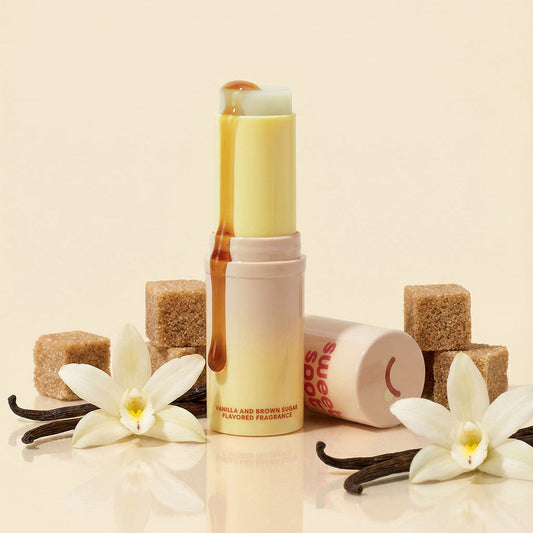 Vanilla-scented  and flavored fragrance product with vanilla beans and flowers on a beige background